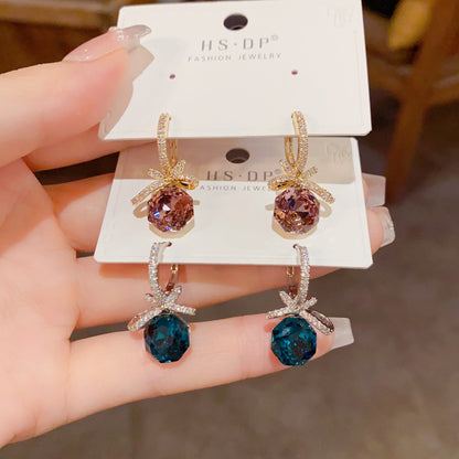 鋯石蝴蝶結鑲鑽耳扣－商品主圖｜https://igowo.tw/