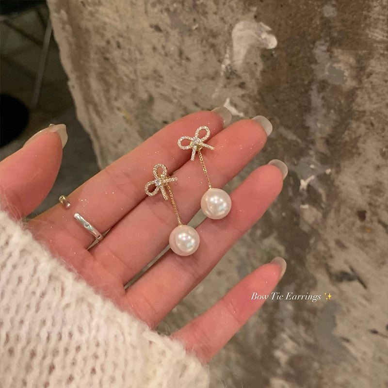 珍珠鋯石蝴蝶流蘇耳環－商品主圖｜https://igowo.tw/