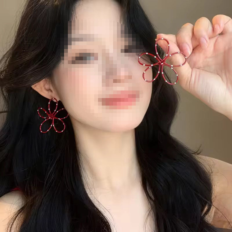 花朵立體誇張耳釘－商品主圖｜https://igowo.tw/