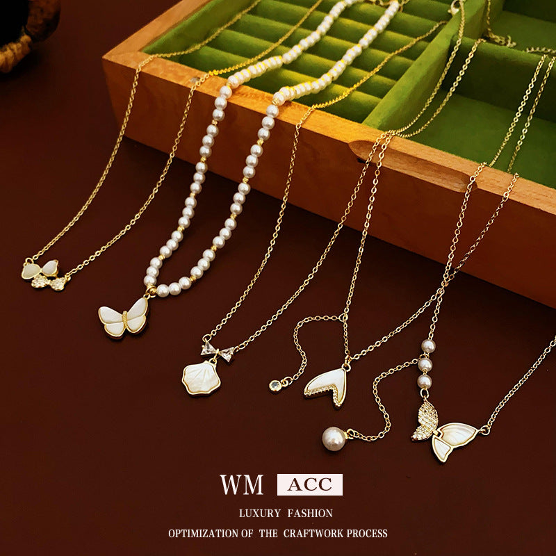 金色貝母蝴蝶電鍍項鍊－細節特寫1｜https://igowo.tw/