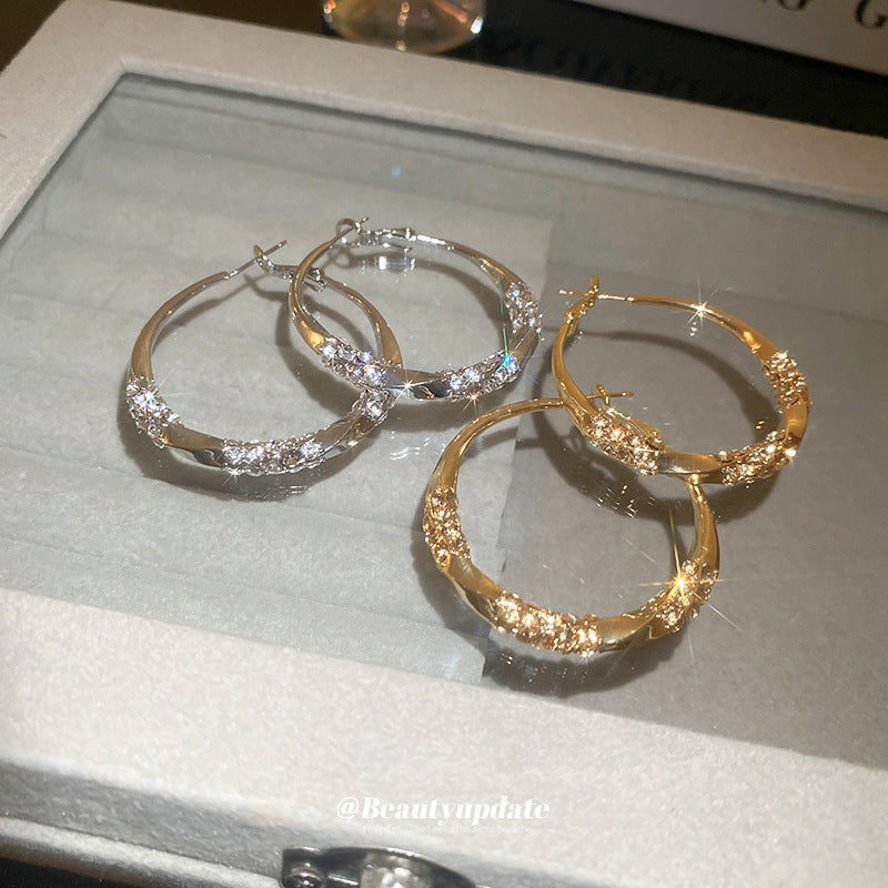 銀針高級感扭曲鑲鉆耳環網紅同款耳圈歐美新品氣質高級感耳飾批發