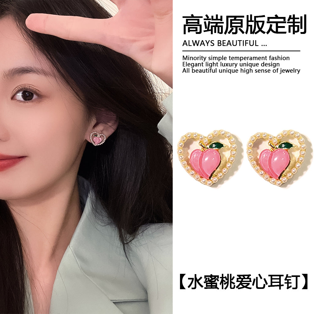 珍珠銀針愛心簡約耳釘－商品主圖｜https://igowo.tw/