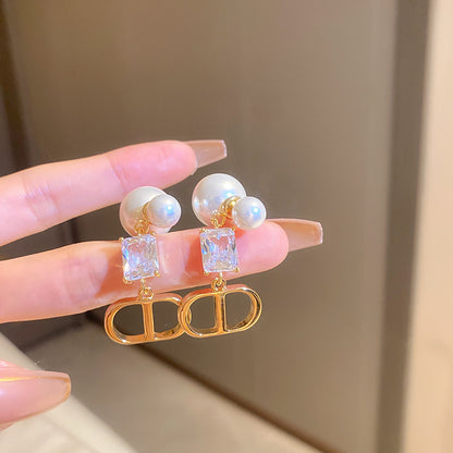 珍珠銀針蝴蝶鑲鑽耳釘－細節特寫62｜https://igowo.tw/