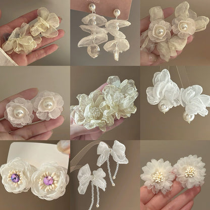 珍珠銀針花朵耳釘－商品主圖｜https://igowo.tw/