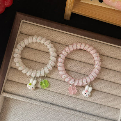 粉色兔子花朵髮圈－第二視角實拍｜https://igowo.tw/