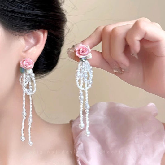 粉色珍珠花朵流蘇耳環－商品主圖｜https://igowo.tw/