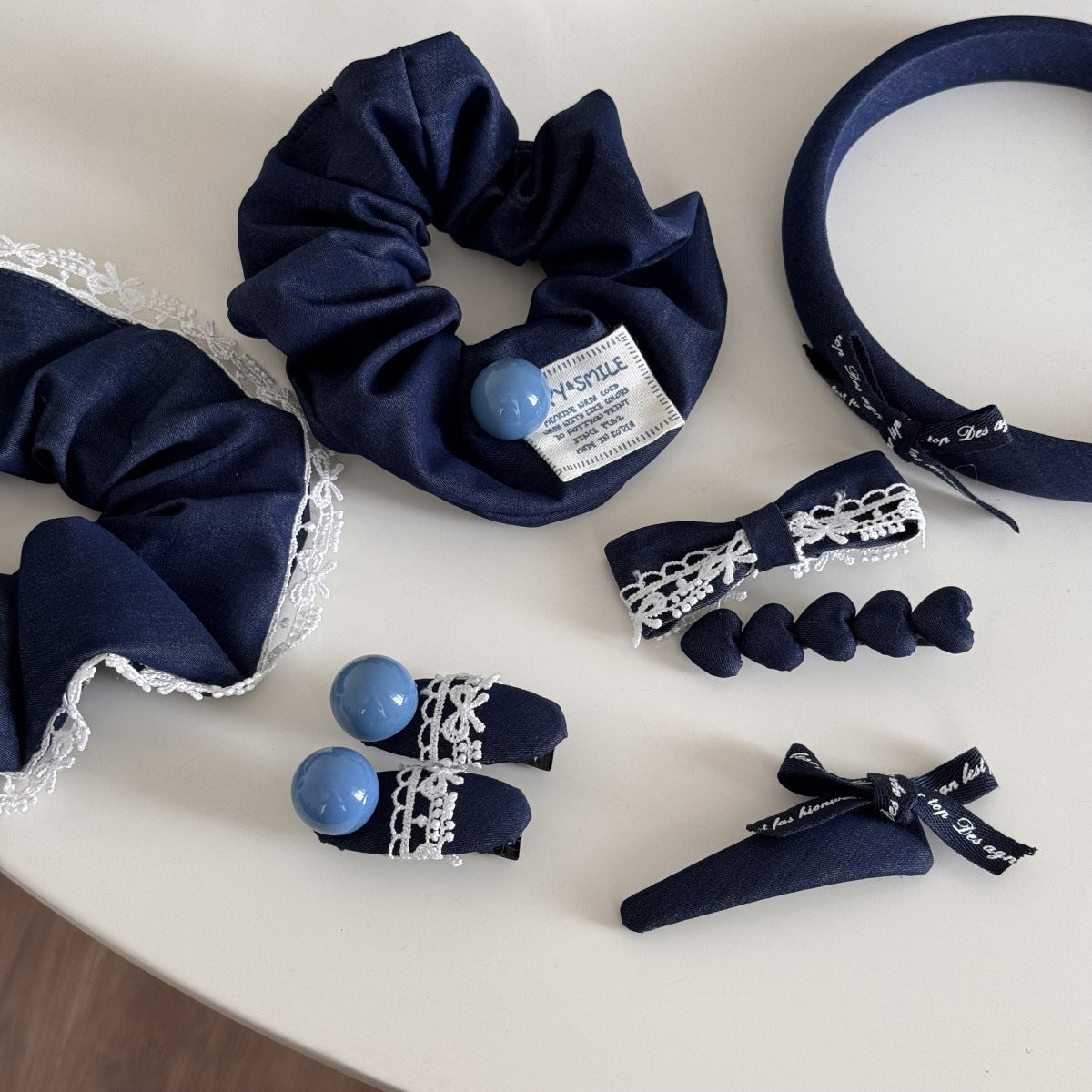 蕾絲蝴蝶結圓珠髮夾－藏青組-髮箍款實拍｜https://igowo.tw/