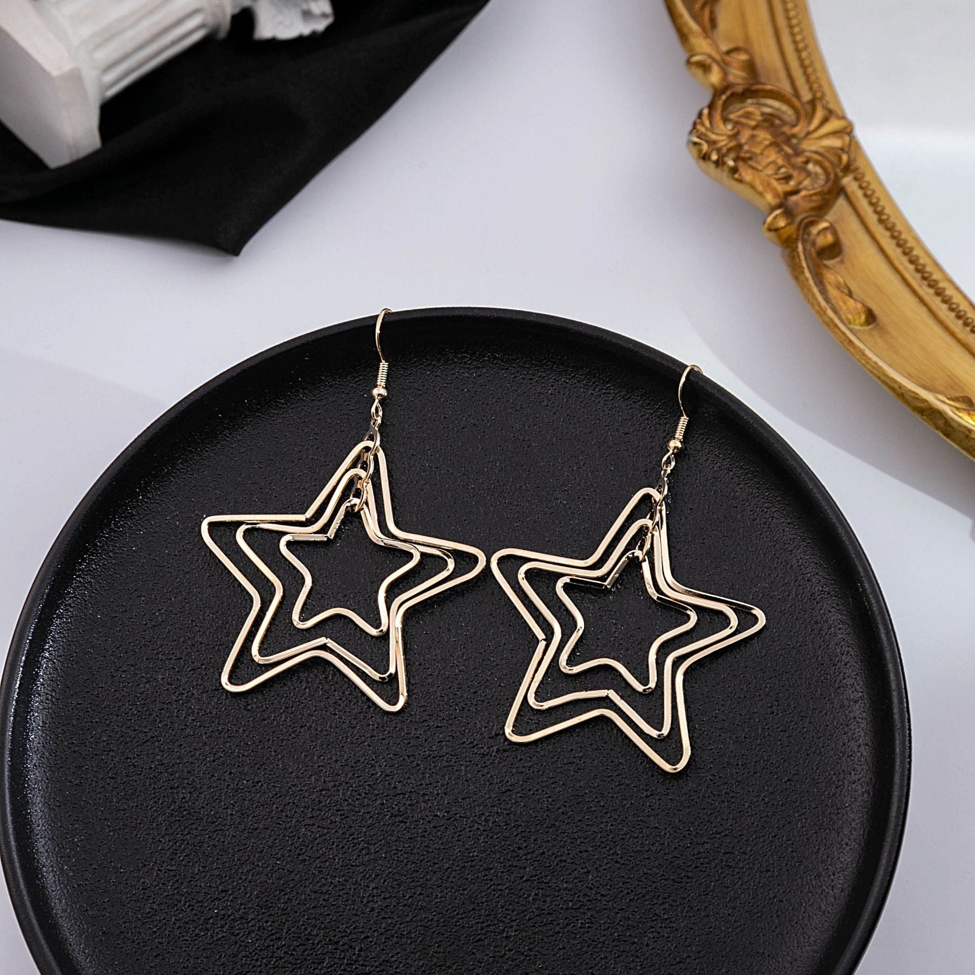星星蝴蝶鏤空多層耳鉤－2/銀款細節｜https://igowo.tw/