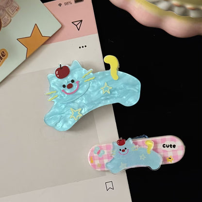 藍色壓克力貓咪髮夾－貓咪橢圓髮夾款實拍｜https://igowo.tw/