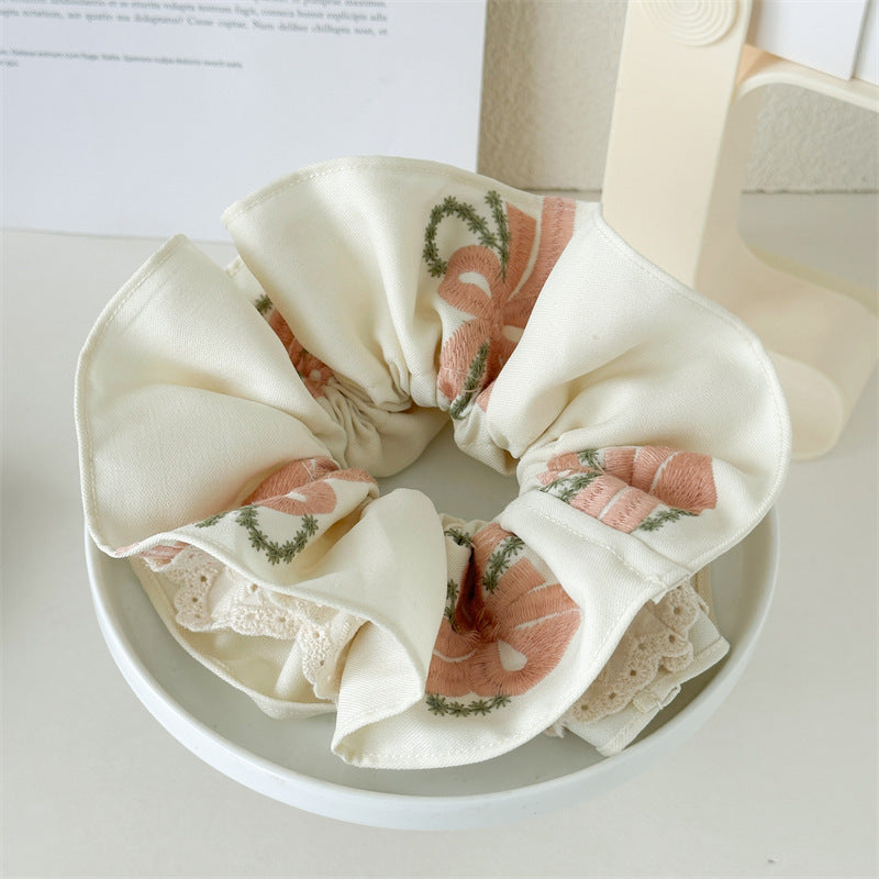 粉色蝴蝶結大腸圈髮圈－商品主圖｜https://igowo.tw/