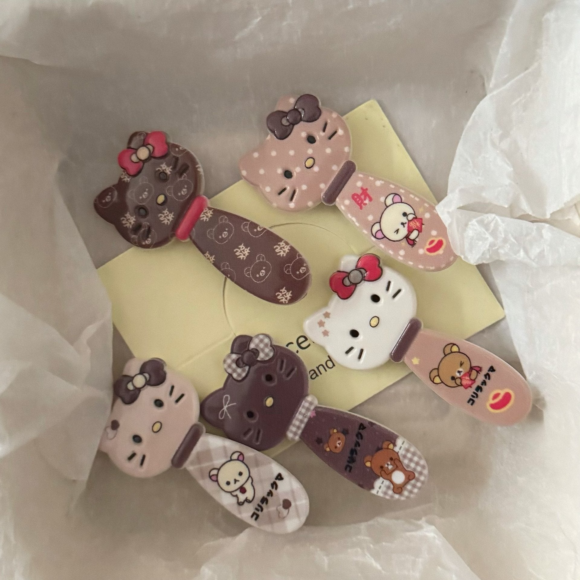 棕色小熊貓咪髮夾－商品主圖｜https://igowo.tw/