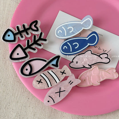 魚尾卡通髮夾－魚魚髮夾-藍魚刺款實拍｜https://igowo.tw/