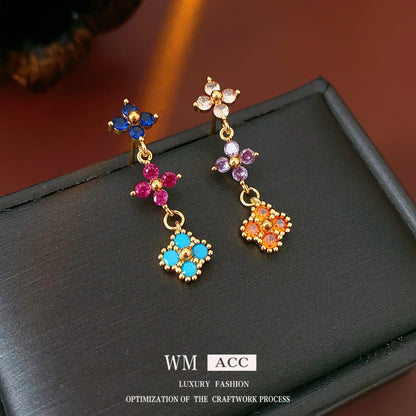 金色銀針花朵電鍍耳釘－商品主圖｜https://igowo.tw/
