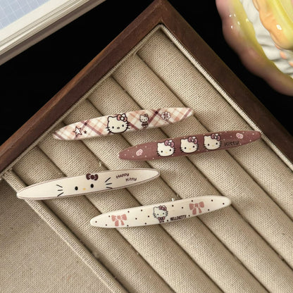 棕色貓咪橢圓髮夾－咖色方格髮夾款實拍｜https://igowo.tw/