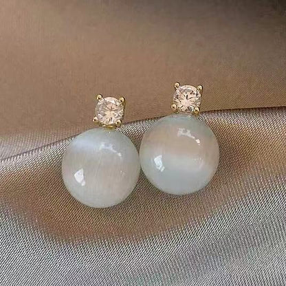 貓眼石圓形簡約耳釘－商品主圖｜https://igowo.tw/