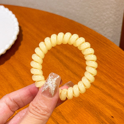 繽紛彈力繩簡約髮圈－絲印米色款細節8｜https://igowo.tw/
