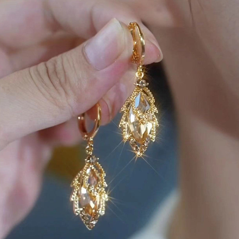 金色鋯石樹葉耳釘－商品主圖｜https://igowo.tw/