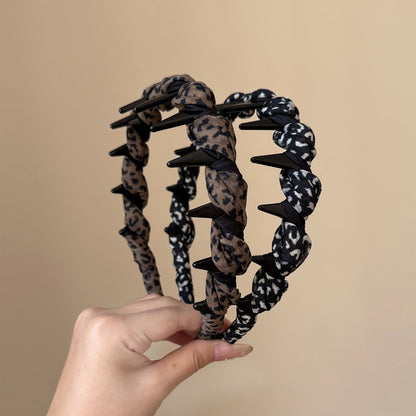 豹紋纏繞簡約髮箍－黑豹紋帶齒髮箍款實拍｜https://igowo.tw/