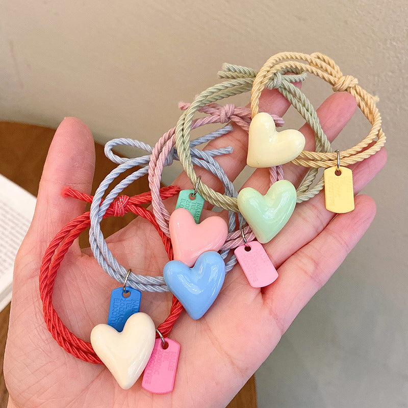 愛心簡約髮圈－馬卡龍黃 1條款實拍｜https://igowo.tw/