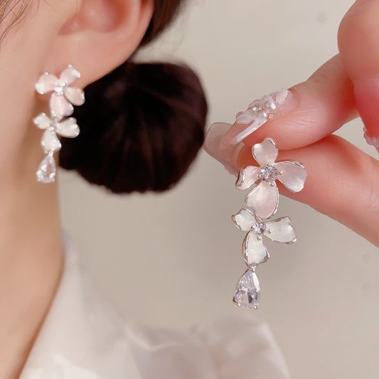 鋯石花朵水滴流蘇耳墜－商品主圖｜https://igowo.tw/