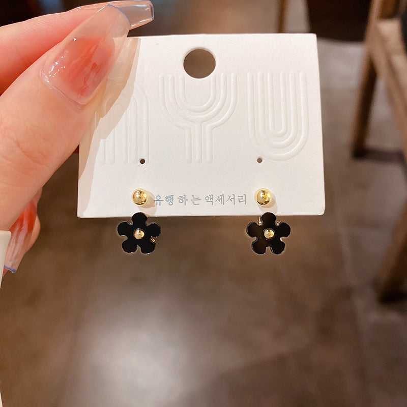 黑色山茶花蝴蝶結耳環－細節特寫11｜https://igowo.tw/