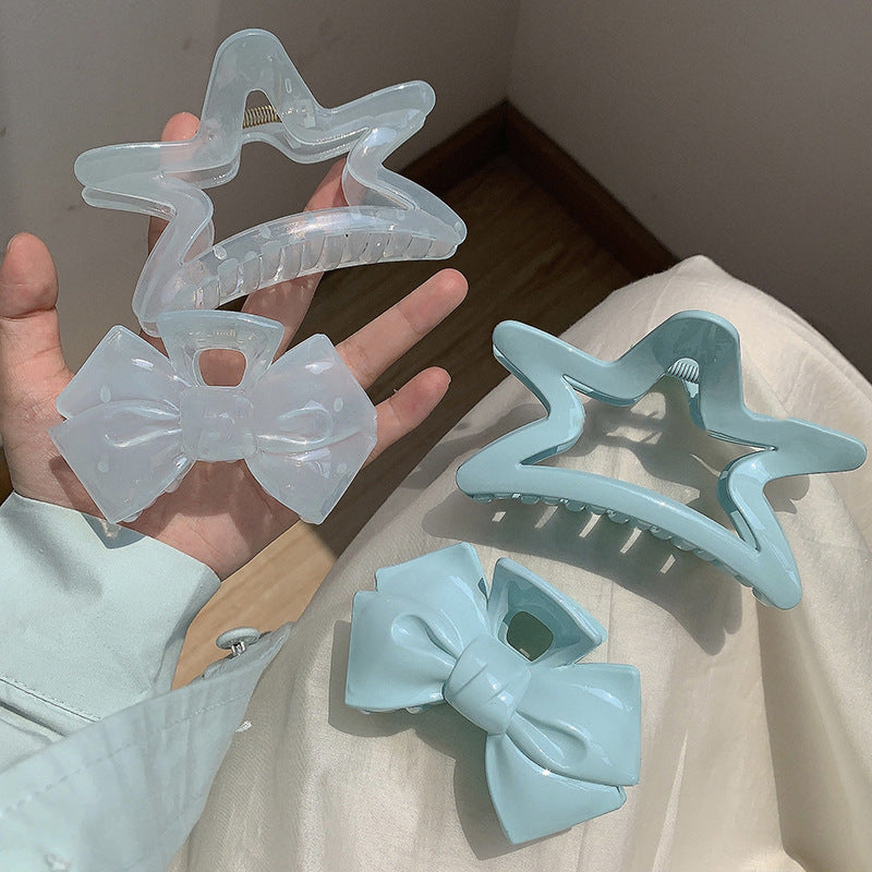 藍色蝴蝶結星星鯊魚夾－商品主圖｜https://igowo.tw/