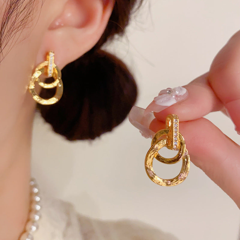 金屬交叉圓形簡約耳環－商品主圖｜https://igowo.tw/
