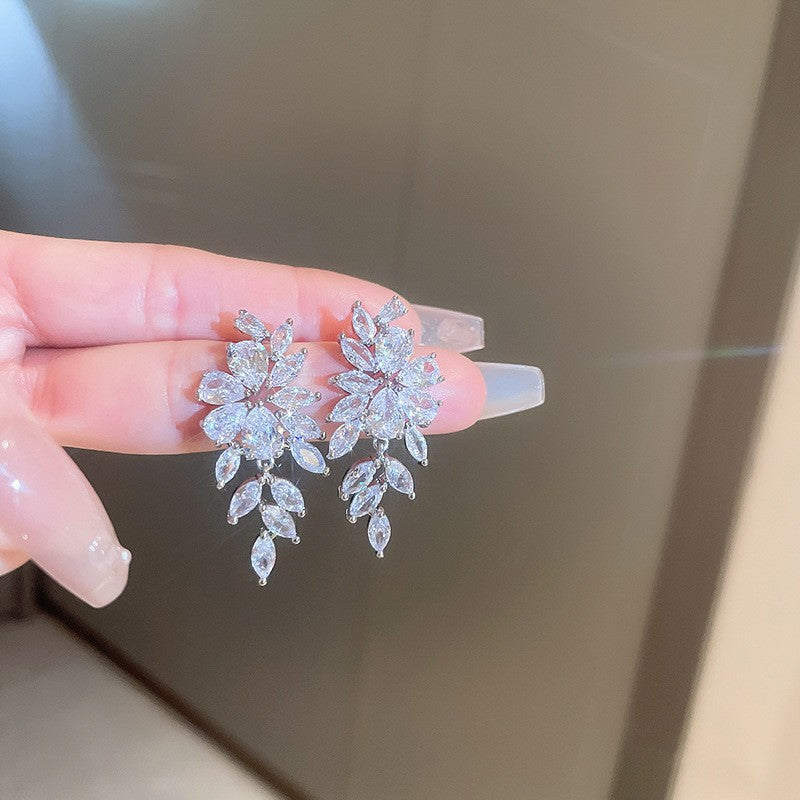 銀針超閃鑲鉆牛角不對稱珍珠耳釘女冷淡風小眾耳環輕奢高級感耳飾