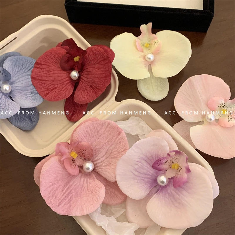 粉色蝴蝶花朵髮夾－膠片款-淺藍款實拍｜https://igowo.tw/