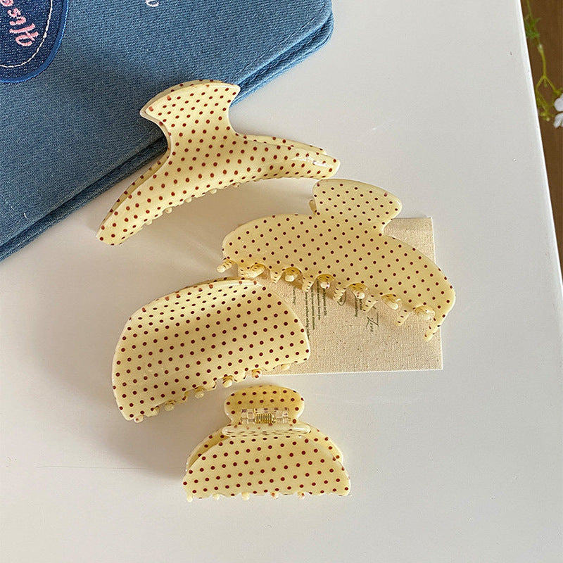 黃色波點簡約鯊魚夾－商品主圖｜https://igowo.tw/