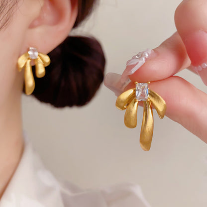 金屬蝴蝶結拉絲耳環－第二視角實拍｜https://igowo.tw/