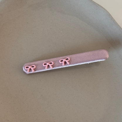 粉色布面蝴蝶結髮夾