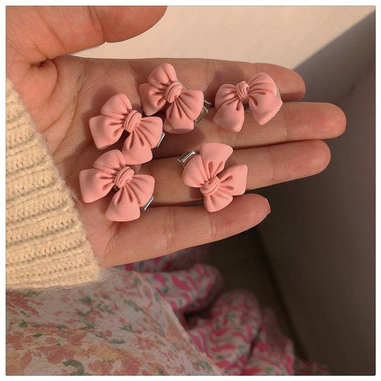 粉色蝴蝶結山茶花髮夾
