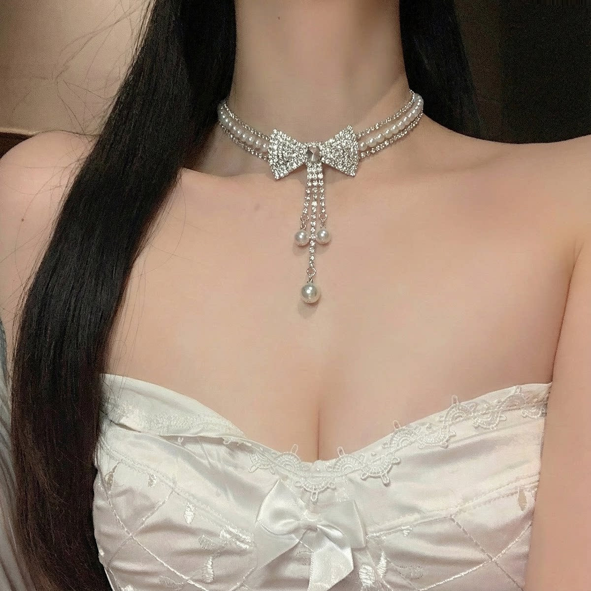 珍珠蝴蝶結流蘇項鍊－商品主圖｜https://igowo.tw/