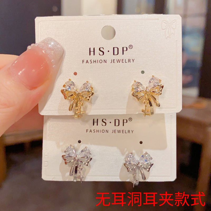 鋯石蝴蝶結耳夾－商品主圖｜https://igowo.tw/