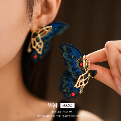 銀針蝴蝶愛心刺繡耳釘－3#銀針-彩色款實拍｜https://igowo.tw/