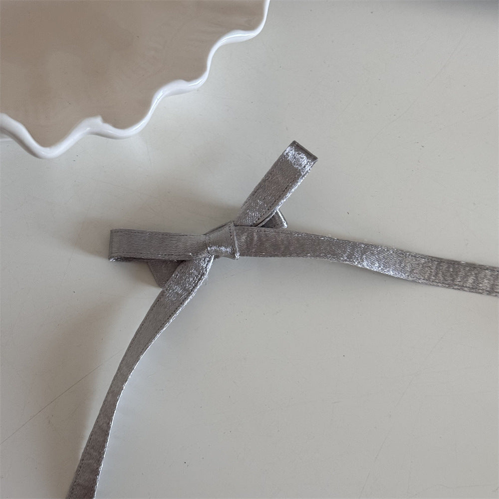 皮革金屬蝴蝶結髮夾－銀色-白心鑽單層款細節｜https://igowo.tw/