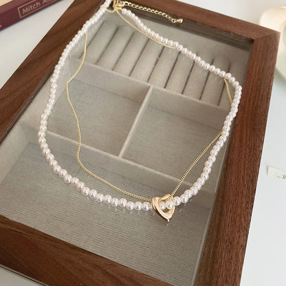 白色珍珠愛心鑲鑽耳環－細節特寫4｜https://igowo.tw/