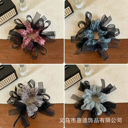 網紗蝴蝶結簡約髮圈－藍色豹紋款實拍｜https://igowo.tw/