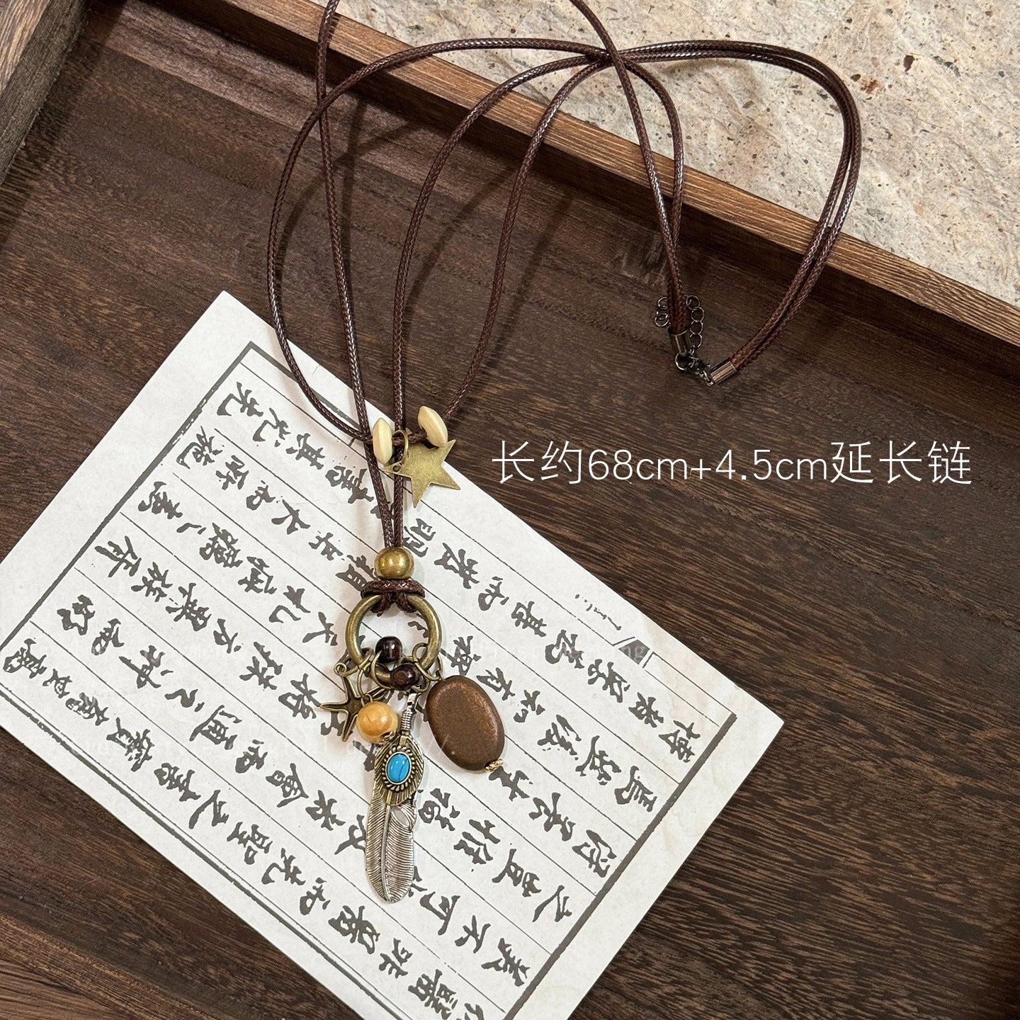 串珠圓形鏤空墜飾項鍊－項鍊-金色-咖色-樹葉款細節｜https://igowo.tw/