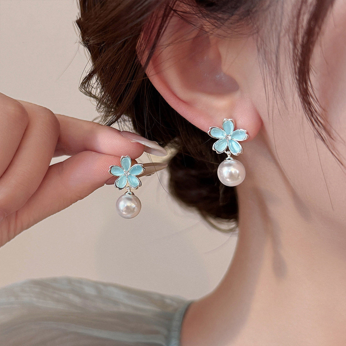 S925綠色貓眼石花朵耳環－商品主圖｜https://igowo.tw/