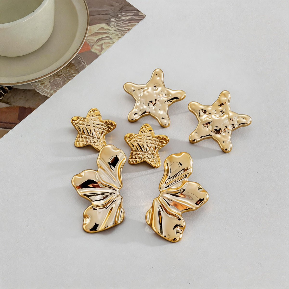 金屬海星花朵耳釘－2#鋼針-金色款實拍｜https://igowo.tw/