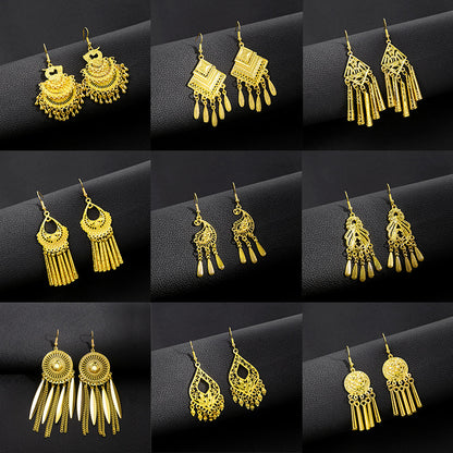 金色鈴鐺樹葉流蘇耳環－商品主圖｜https://igowo.tw/