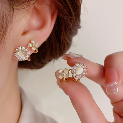 貓眼石花朵簡約耳釘－商品主圖｜https://igowo.tw/