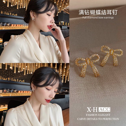 蝴蝶結微鑲耳釘－商品主圖｜https://igowo.tw/
