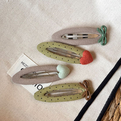 波點橢圓簡約髮夾－商品主圖｜https://igowo.tw/