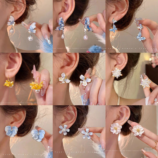 珍珠蝴蝶花朵簡約耳環－商品主圖｜https://igowo.tw/