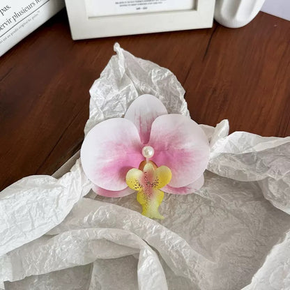 粉色蝴蝶花朵髮夾