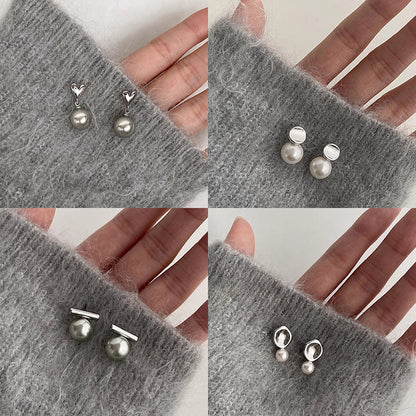 S925灰色珍珠愛心耳釘－商品主圖｜https://igowo.tw/