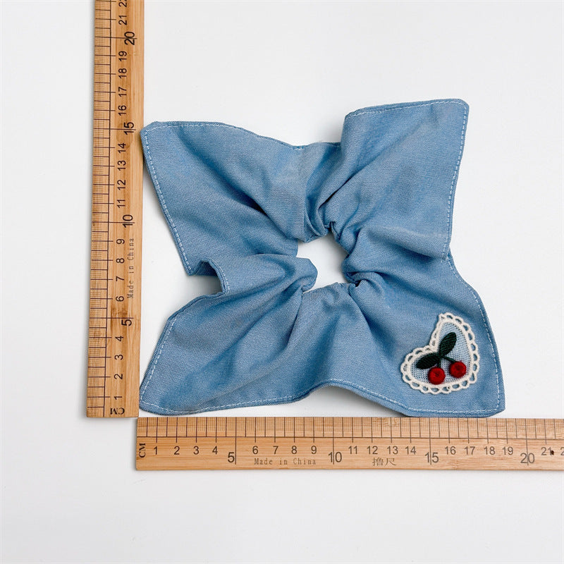 大腸圈三角形刺繡髮圈－細節特寫1｜https://igowo.tw/